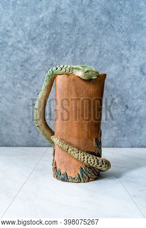Handmade Ceramic Carafe Snake Pattern Design.