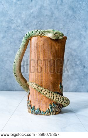 Handmade Ceramic Carafe Snake Pattern Design.