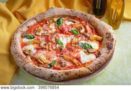 Capricciosa Pizza With Cheese, Bacon And Tomatoes And Basil, Italian Meal