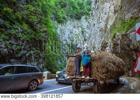 Bicaz Gorges, Romania - August, 2019 : Hay Wagon Going Through Bicaz Canyon In Romania. Bicaz Key Is