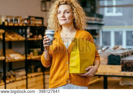 Zero Waste Concept. Shopping Bag, Blond Woman Holds Reusable Cup, Paper Bag With Fresh Food. Curly G
