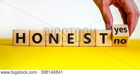 Honest Symbol. Hand Turnes A Cube And Changes The Words 'honest No' To 'honest Yes'. Beautiful Yello