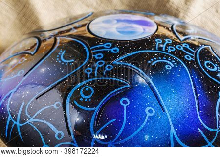 Colors Steel Tongue Drum, Vadjraghanta, Tank Drum Close-up Modern Musical Instrument
