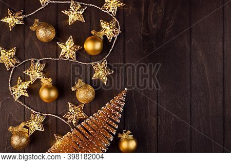 Youth Stylish Decoration For New Year Party - Golden Festive Spruce, Balls, Stars Lights On Dark Woo