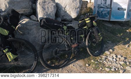 The Mixed Terrain Cycle Touring Bike With Bikepacking. The Trip On Multitrack Bike, Outdoor Road In 