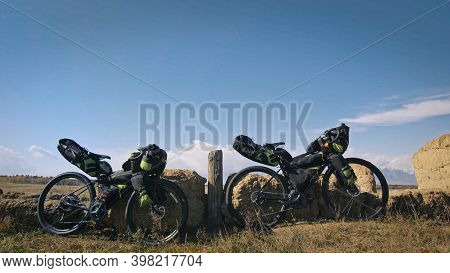 The Mixed Terrain Cycle Touring Bike With Bikepacking. The Trip On Multitrack Bike, Outdoor Road In 