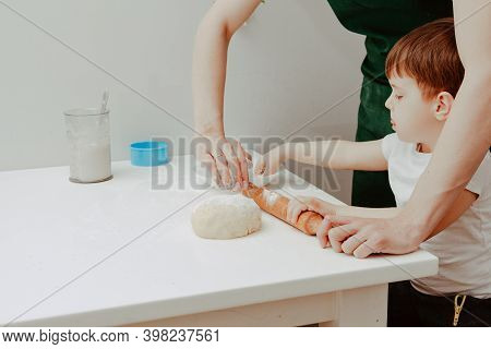 Little Boy Helps Mother To Cook  Making Homemade Coockies. Casual Lifestyle In Home Interior, Pretty