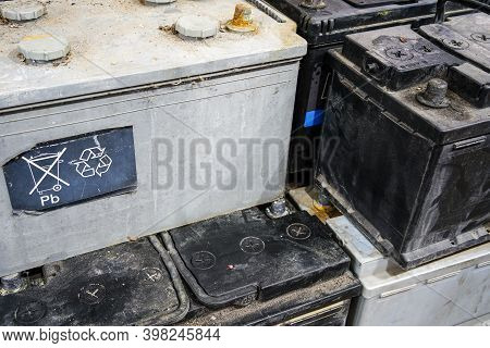 A Pallet With Used Car Batteries Awaiting Recycling