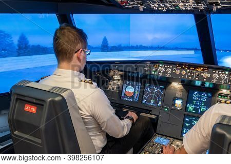 Gdansk, Poland - December 06, 2020: Instructors In Flight Simulator For The Training Of The Pilots.