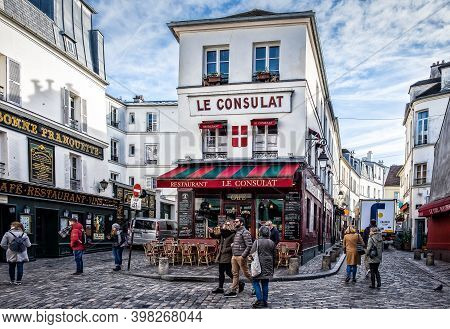Paris, France, Feb 2020, urban scene by the restaurant`Le Consulat`in the heart of Montmartre district
