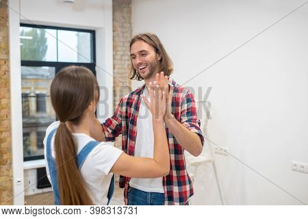 Happy Couple Claping Hands And Feeling Happy