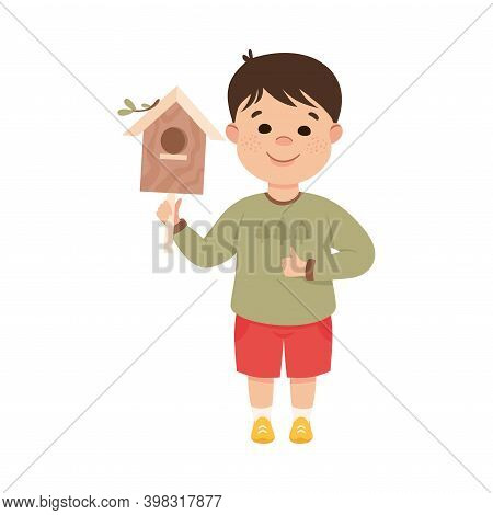 Obedient Boy With Good Breeding Holding Wooden Bird House Vector Illustration