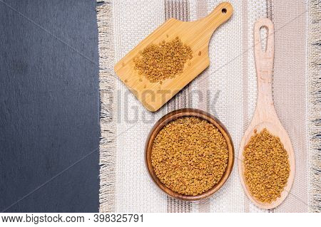 Healing Drink, Seeds, Medicinal Plant Fenugreek On A Wooden Light Table Closeup. Shambala Grains For