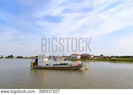 French wooden oyster boat at the river the Charente