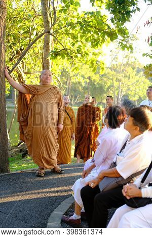 Buddhist Monk Teaching Dhamma To People
