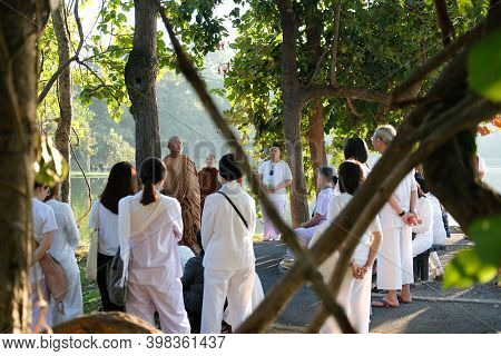Buddhist Monk Teaching Dhamma To People