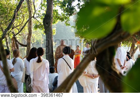 Buddhist Monk Teaching Dhamma To People