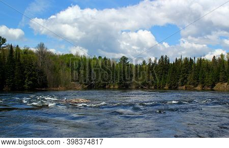 Wild Nature River Landscape In The Canadia Rockies / Adventure Concept