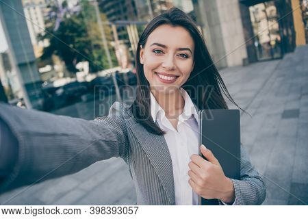 Photo Of Attractive Positive Young Businesswoman Take Selfie Hold Laptop Outdoors In Downtown City C