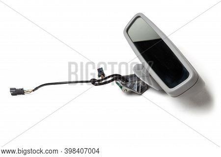 Close-up On A Rear View Mirror From A Sedan For Repair And Replacement After An Accident In A Worksh