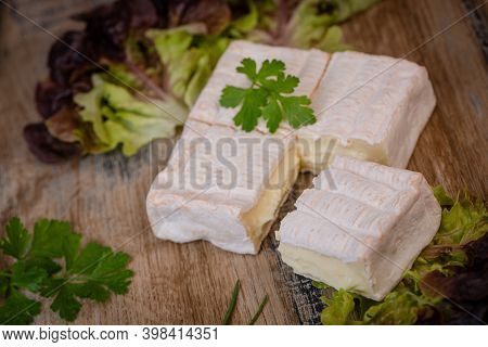 Pont Leveque, French Cheese From Normandy Produced From Cows Milk On Turntable . High Quality Photo