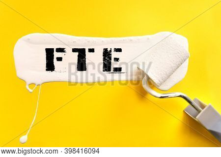 Business And Finance Concept. On A Yellow Background, The Surface Is Painted White With A Brush, On 