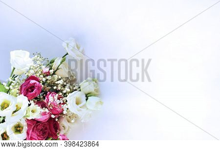 Festive Flower Arrangement - White And Pink Eustoms On A White Background. Background For A Holiday 