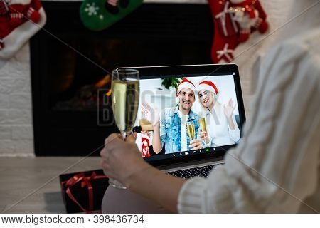 Laptop On The Christmas Table. Video Call With The Family In Times Of Coronavirus.