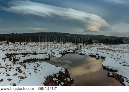 Winter View Of Mountain Landscape, Fresh Cold Stream And Large Meadow At Jizerka Settlement,czech Re