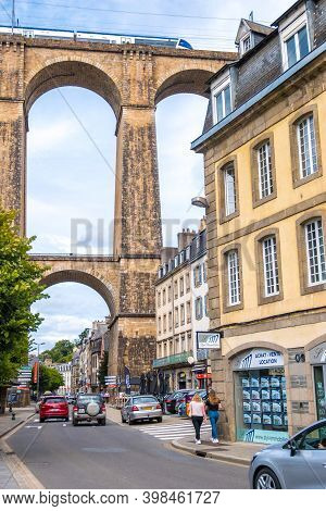 Morlaix, France - August 28, 2019: Street In The Historical Center Of Morlaix With Its Viaduct In Th