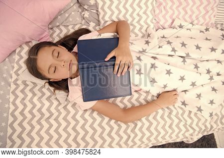 Leave Me To Dream. Little Child Fell Asleep Reading Book. Small Kid See Dream In Bed. Cute Daydreame