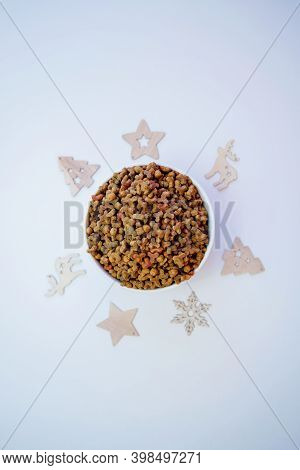 Cat Food In Bowl On Wood Backgroundcat Food In A White Bowl On A White Background, Winter Concept. A