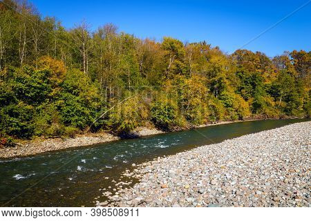Scenic Landscape With Beautiful Mountain River. Autumn In Mountain Forest. Sunny Day.