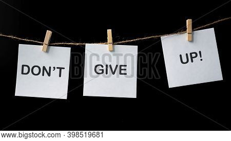 Motivational Phrase, Dont Give Up, Wtitten On White Stickers On Black Background