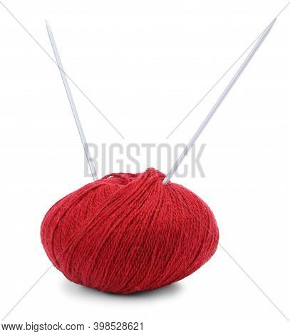 Hank Of Red Yarn And Knitting Needles Isolated On White Background.