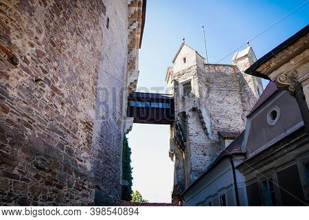 Gothic Imposing Historic Castle Pernstejn At Sunny Summer Day, Stronghold On Rock Above Village Of N