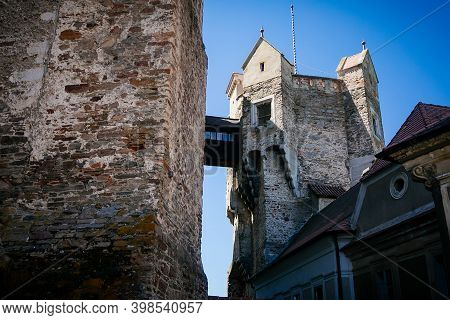 Gothic Imposing Historic Castle Pernstejn At Sunny Summer Day, Stronghold On Rock Above Village Of N