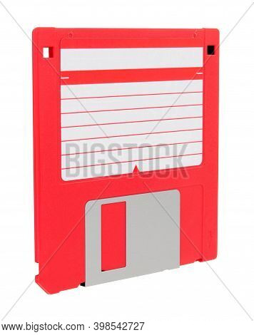 Red 3.5 Inch Compact Floppy Disk With Blank Label Isolated On A White Background