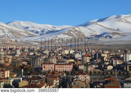 Nigde,turkey-january 15:snowy Hills,high School,businesses And Apartment Buildings.january 15,2017 I