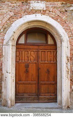 Ancient Door In The Village Of Panicale In Umbria, Italy. High Quality Photo