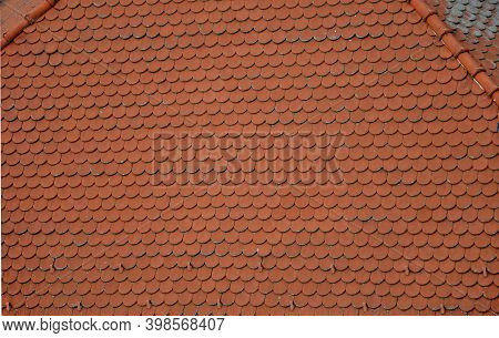 View Of The Roof Made Of Red Brick Burnt Tiles Of The Beaver Type Used In Central Europe On All Hist