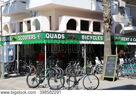 Kos,greece-may 12:tourists Renting  Bicycles From A Local Shop.may 12,2019 In Kos,greece