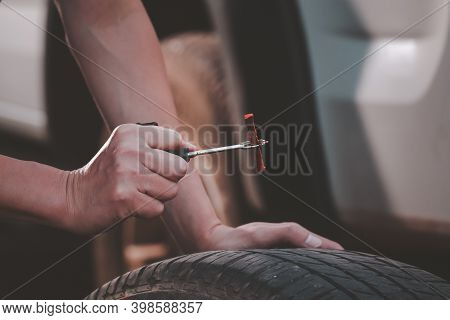 Repair Tires Recap Patch A Tyre , Flat Tire The Tire Is Leaking From The Nail Can A Tire Be Repaired