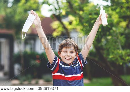 School Kid Boy With Medical Mask As Protection Against Pandemic Coronavirus Quarantine Disease. Chil