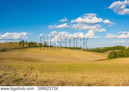 Bagno Vignoni, Italy - September 3rd 2020. The late summer landscape around Bagno Vignoni in in Val d\'Orcia, Siena Province, Tuscany, Italy