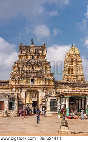 Hampi, Karnataka, India - November 4, 2013: Virupaksha Temple Complex. People Around Gate With Small