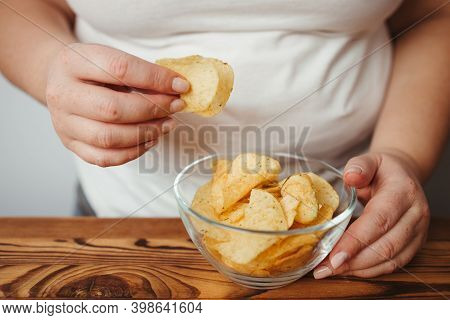 Compulsive Overeating, Mindless Snacking, Junk Food, Unhealthy Meals. Woman Eating Chips From Bowl, 