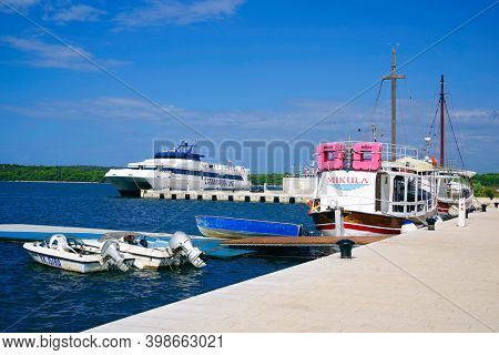PULA, CROATIA - SEPTMBER 18, 2020: Adriatic sea harbour of Pula, Croatia, Europe