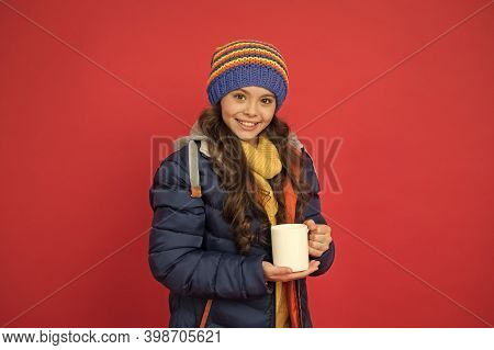 Time To Get Energy. Happy Child Enjoy Hot Drink On Winter Day. Small Girl Hold Tea Or Cocoa Cup Red 