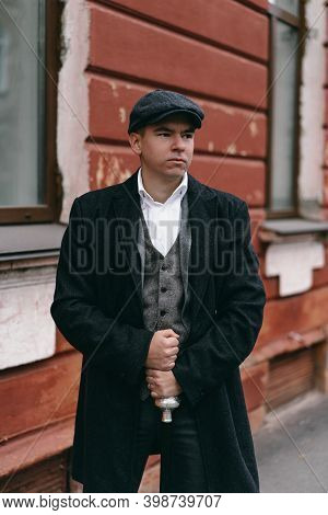 Portrait Of A Man In Retro Style. Peaky Blinders. Vintage.